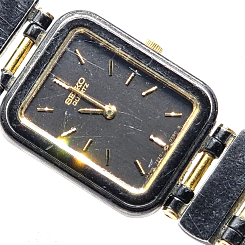 Vintage Womens Seiko 7320 0780 Black & Gold Rectangular 18mm Wrsitwatch
